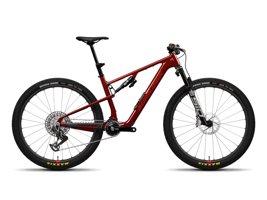 A red full-suspension mountain bike with black components, shown from a side profile on a white background with a soft shadow.
