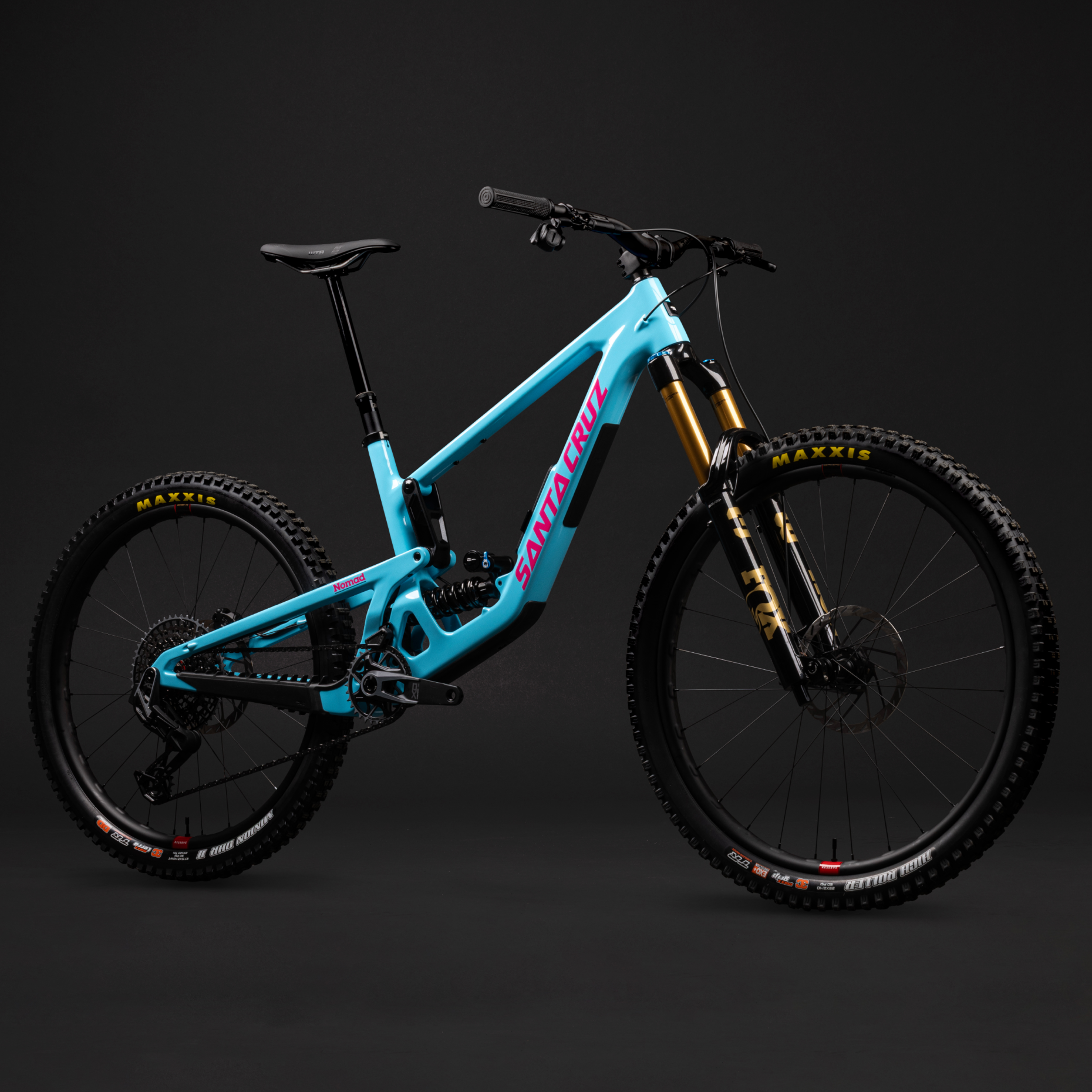 Blue mountain bike on a black background