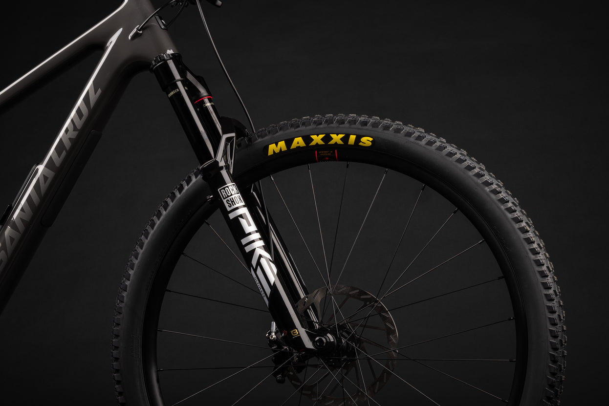 A Rockshox Pike fork mounted to a Santa Cruz mountain bike 