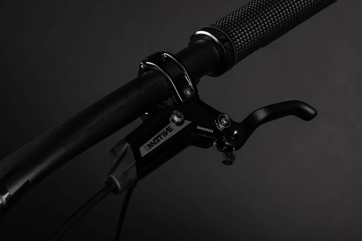 SRAM Motive SLV Brakes and a carbon handlebar